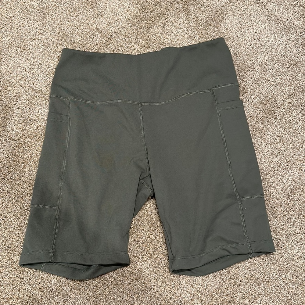 Green biker shorts
